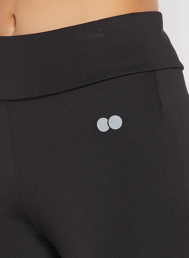 Clovia Black Snug-Fit High-Rise Active Tights in Black for Women | Best Price UAE